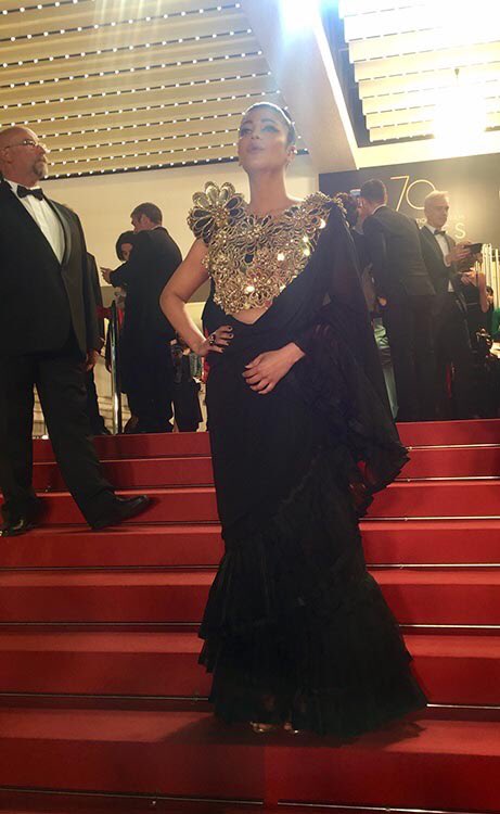 filmfare's tweet photo. Such a rockstar!

@shrutihaasan makes her #CannesFilmFestival red carpet debut in this fierce desi avatar. Love every bit of it! https://t.co/D9kPj6SGfb