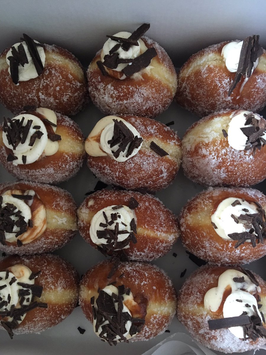 JamVsCustard's tweet photo. Today's #TeamJam doughnuts at @BritishOakBirm Farmers Market... rhubarb trifle and lemon and poppy seed meringue #Stirchley https://t.co/ZikFFOYWMv