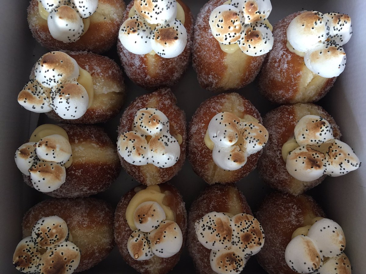 JamVsCustard's tweet photo. Today's #TeamJam doughnuts at @BritishOakBirm Farmers Market... rhubarb trifle and lemon and poppy seed meringue #Stirchley https://t.co/ZikFFOYWMv