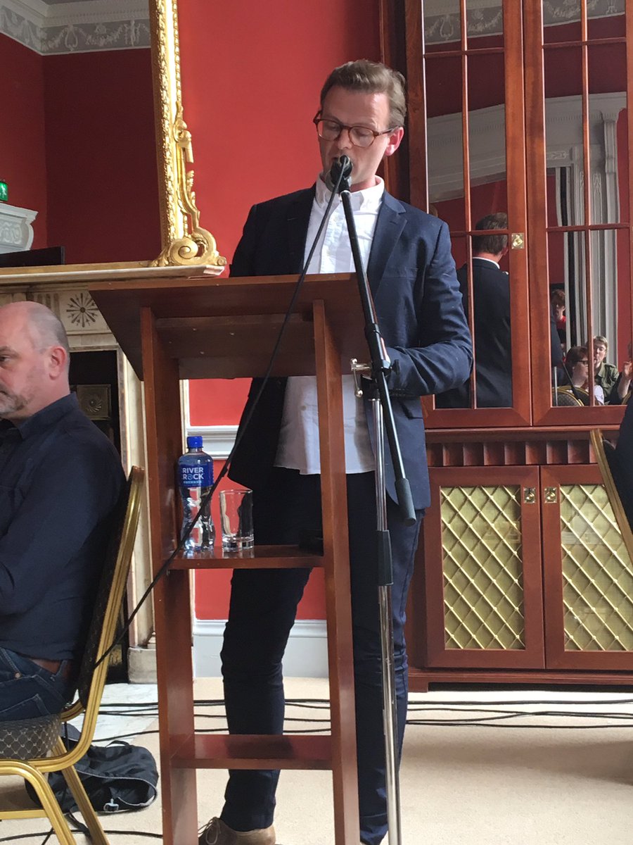 GCNmag's tweet photo. Denis Kehoe reading at #GCNtalks: "Here I was and there were 100s like me." @GCNmag @ILFDublin Watch: https://t.co/5EzSguvq5I https://t.co/benV95uoS0