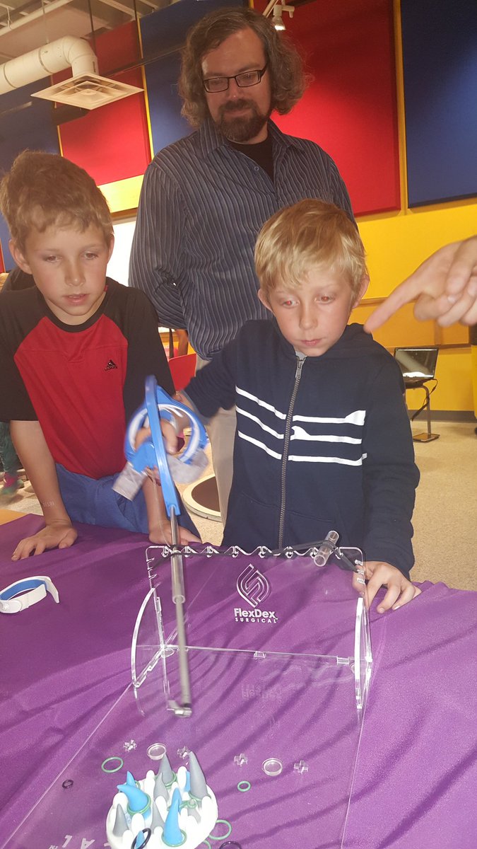 FlexDexSurgical's tweet photo. Feeling the joy at @aahandsonmuseum #TechTwilight with @FlexDexSurgical needle driver. Kids love it!  #LetThemPlay #STEM https://t.co/StWhLLsVAQ
