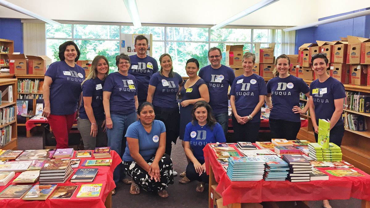 DukeFuqua's tweet photo. Our staff at #Durham's Lakewood Elementary for @Book_Harvest's event that supplied kids with summer books @LakewoodBulldog #fuquaserves https://t.co/4Krwi2o1Dz