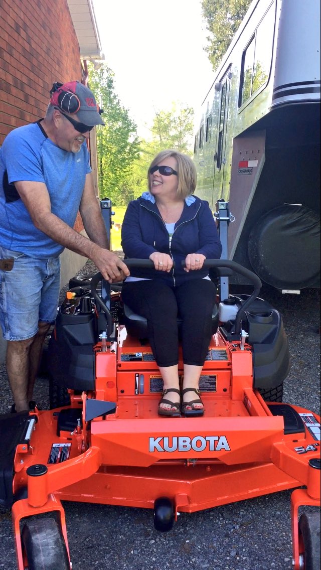 tararoddick's tweet photo. My dad teaching my mom how to drive the new lawn mower is the cutest thing 😭 https://t.co/jXPXyuTyIu