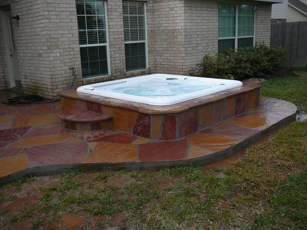 HotTubsOfKaty's tweet photo. We customize installs to make your backyard as unique as you are. Round the edges of flagstone. #HTK #HOTTUBSOFKATY #INGROUNDSPA https://t.co/7V9KdRYxhl