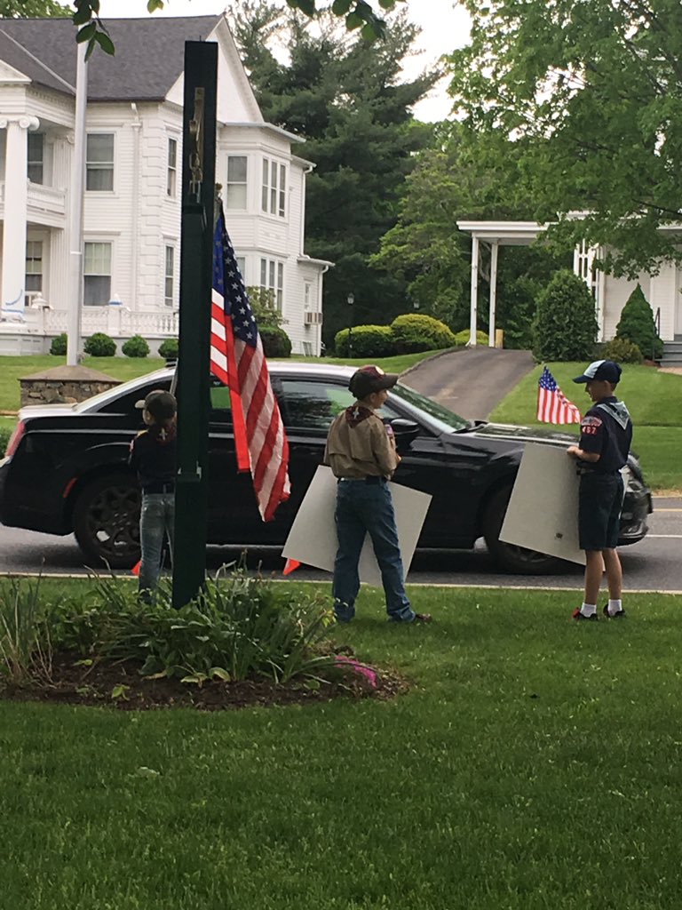 Pack 467 celebrates Armed Forces Day on the green.