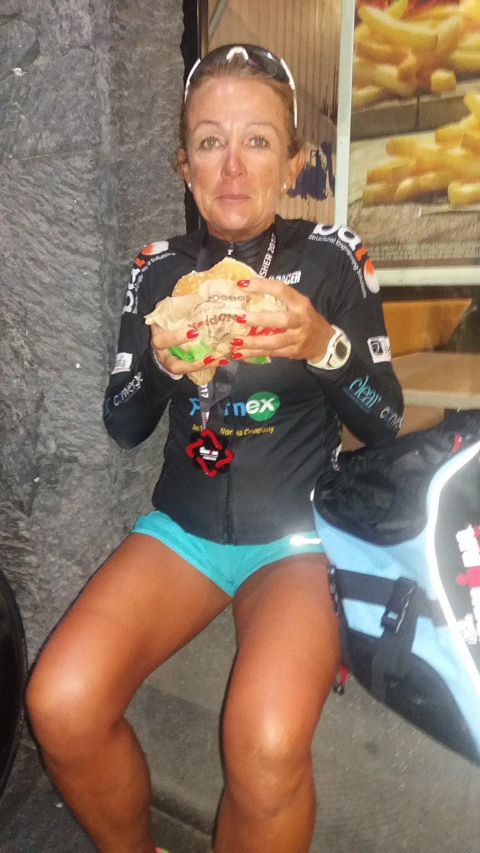 Happiness is... A big fat burger after finishing an ironman . Slowest time for a long time 13 hrs 51 but number  39 is in the bag