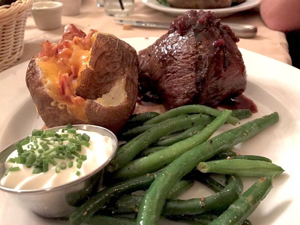 The Baseball Sirloin with a loaded baked potato and green beans. The port-wine cherry sauce puts it out of the park. (photo: Mary T., Yelp)