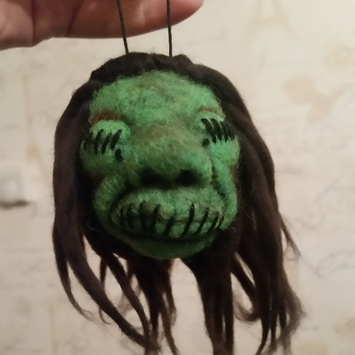 Heartfeltbylisa's tweet photo. Making some new items, #Halloween starts early this year. #shrunkenhead #voodoo #horrorart #halloweendecor #darkmagic #macarbre #needlefelt https://t.co/3hXLMf95nw