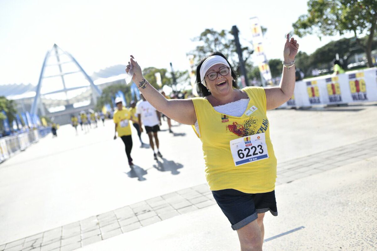 Discovery_SA's tweet photo. It's time to celebrate, as the walkers cross the finish line @MMStadium #DurbanBigWalk https://t.co/0D32iCXdfj