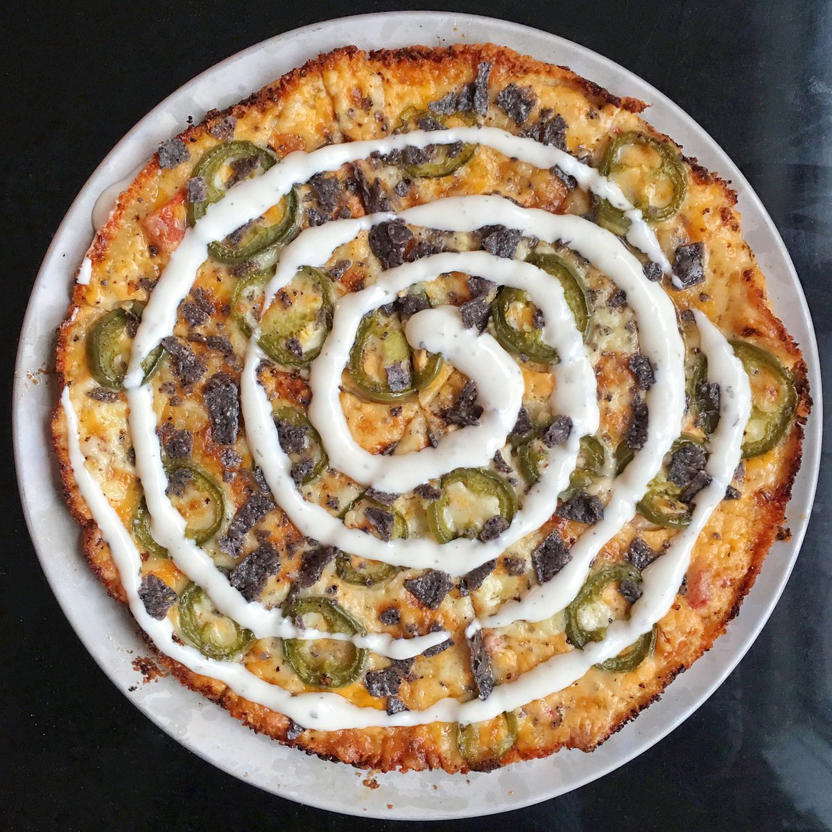 MargotsPizza's tweet photo. Tweaking the Ranchero. Added diced tomatoes and green chiles and a post-oven tortilla-chip crumble https://t.co/XtsPauoY6L