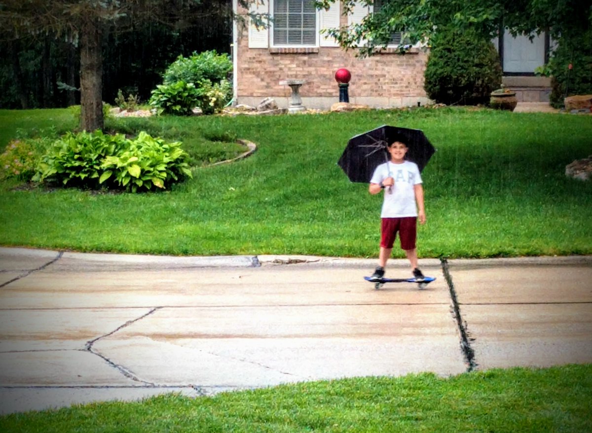 fatheringthree's tweet photo. Determined to play outside. #RainyDay #RipStik https://t.co/MS2GkWH4LX