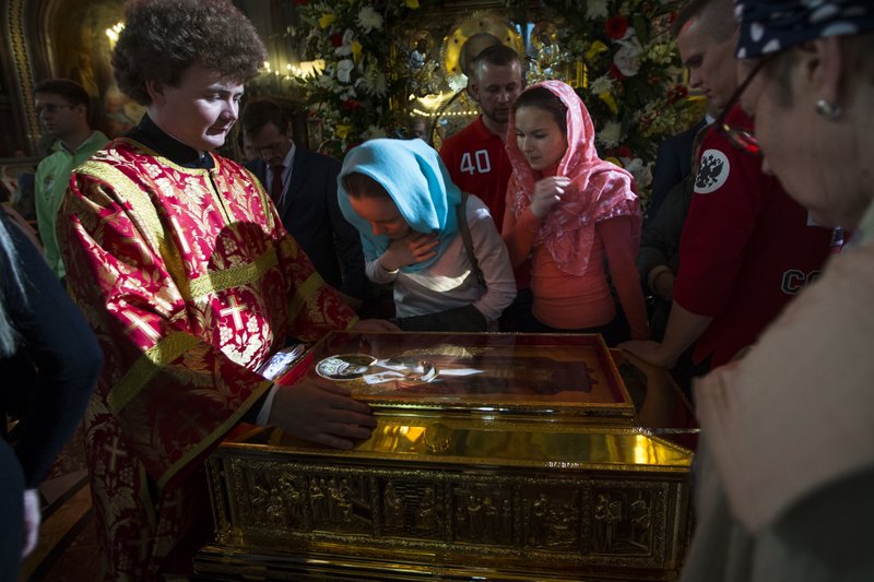 AP_Europe's tweet photo. Russians are lining up to see the relics of St. Nicholas. @jeheintz explains the meaning of the man and the moment. https://t.co/YCTpl4mikZ https://t.co/ry5gNvYG72
