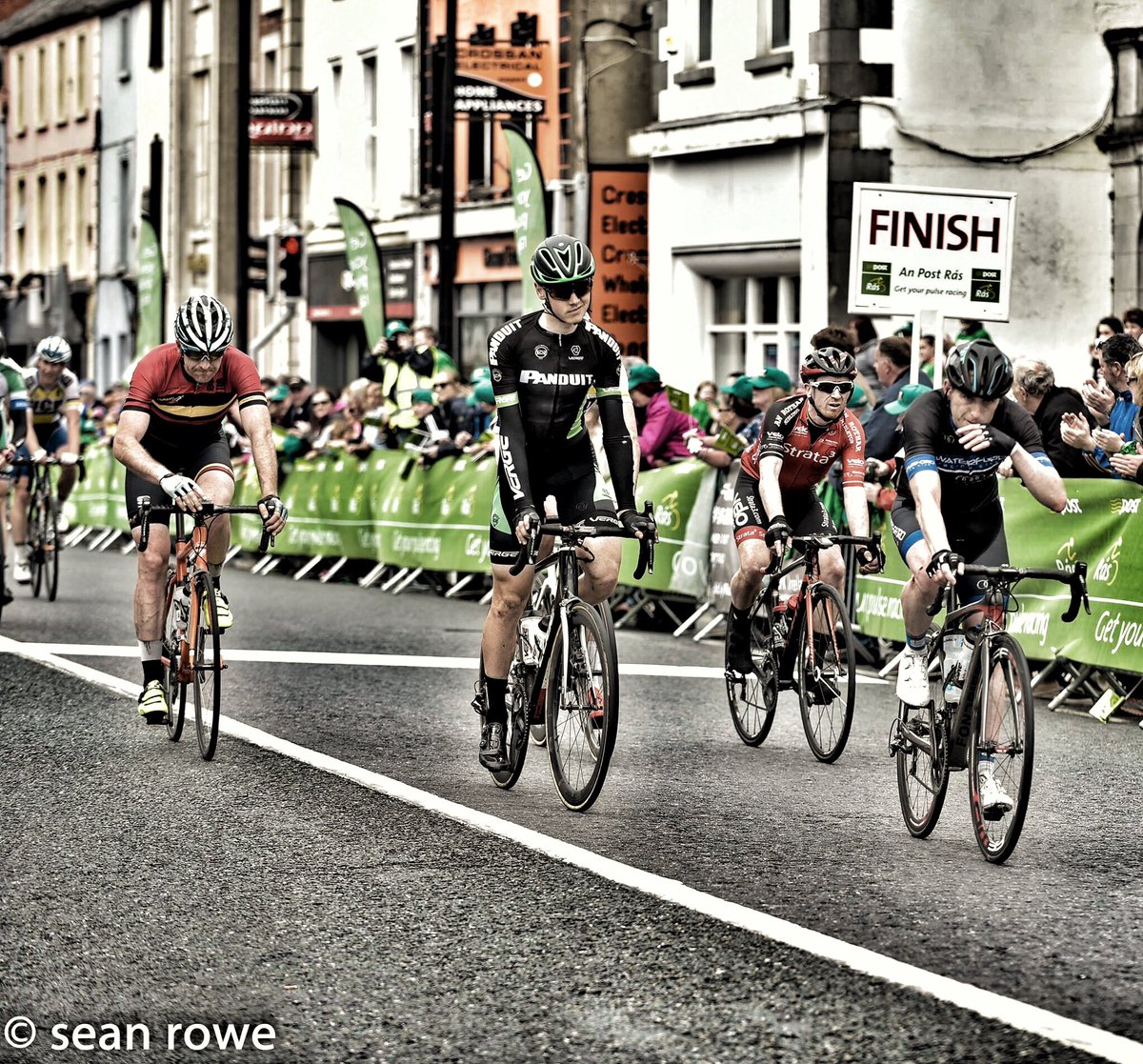 Strata3VeloRev's tweet photo. #MickFitz crossing the line @strata3 @VeloRevolution @StephenRocheCyc @RotharAn @SkodaIRL pic by #SeanRowe always gives 100% effort https://t.co/JkoUQagBYQ