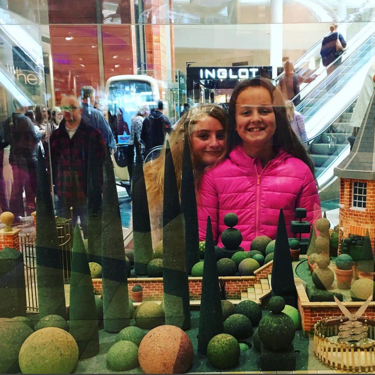 Eppie and Caoimhe looking at the model of the <a href="/DundrumTC/">Dundrum Town Centre</a> Garden of Pure Imagination!