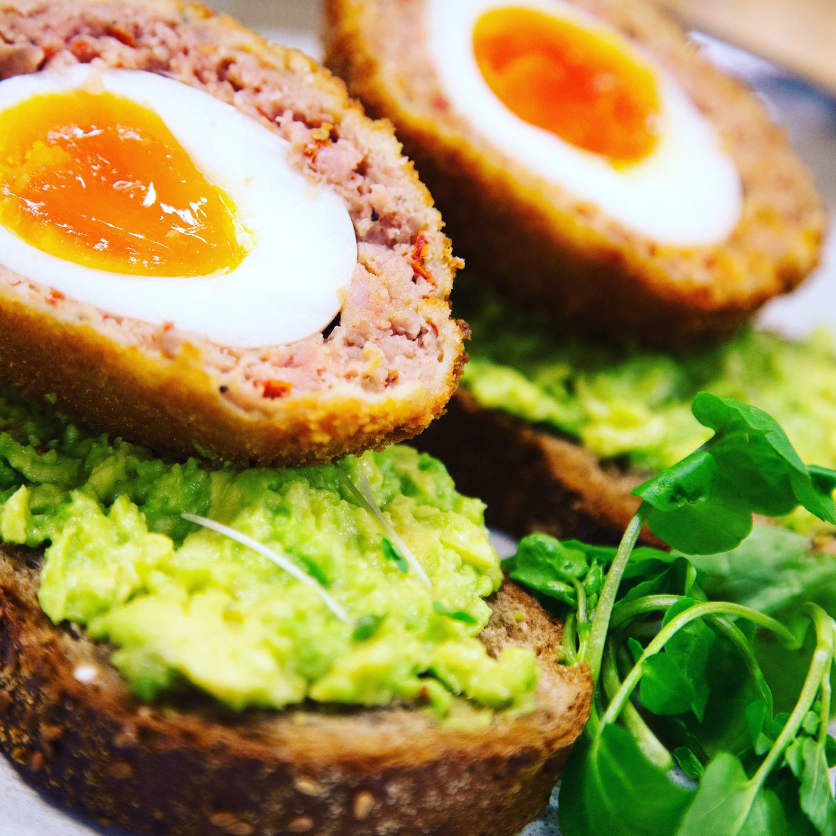 Healthy start to the week? All day breakfast scotch egg on smashed avocado rye toast. #happybellyscotchegg #HealthyEating #delicious #deli