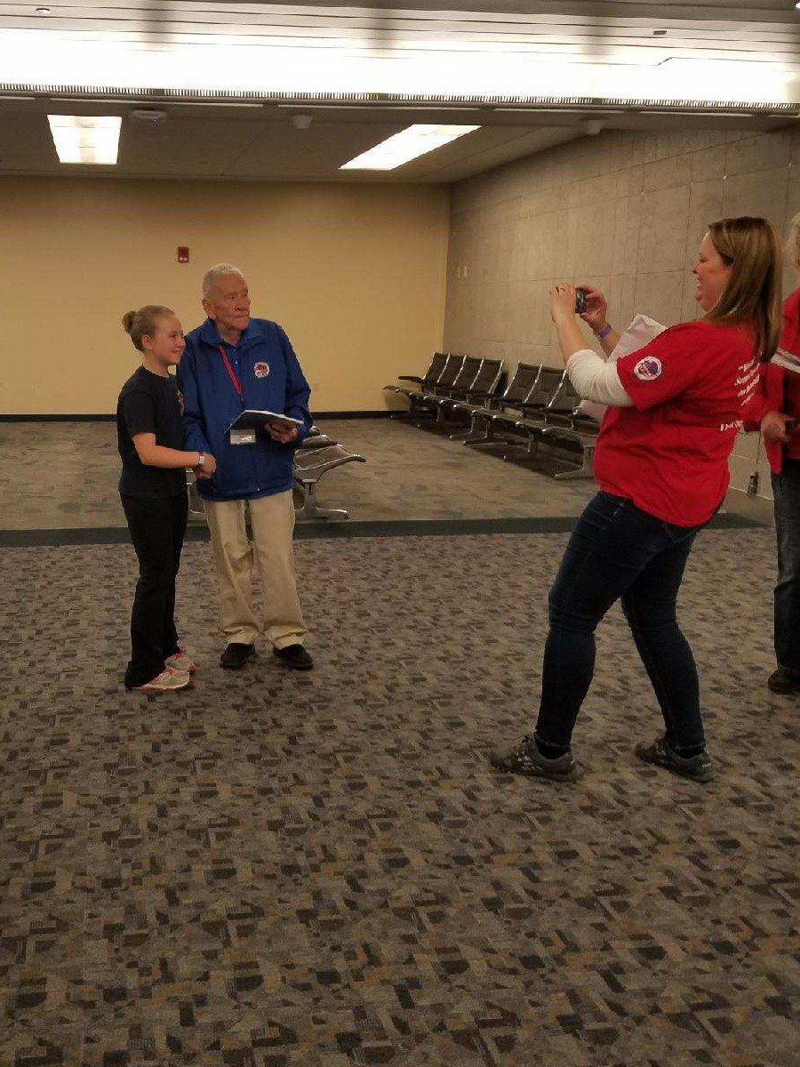 ReeseCohn's tweet photo. Reese (and Charlee) welcomed home, thanked Veterans returning home from Honor Flight. Great meeting these heroes &amp; recognizing their service https://t.co/QhdEk8REU6
