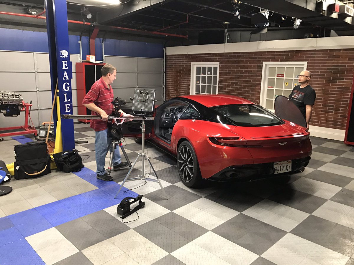MotorWeek's tweet photo. The @astonmartin DB11 getting star treatment on this rainy Monday morning. https://t.co/NJlcXnFEex