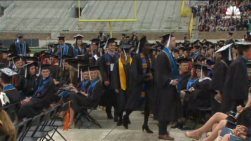 academicsandra's tweet photo. BRAVO! The #Flightin'Irish: Dozens of #NotreDame #students walked out when Mike #Pence took the stage https://t.co/0xiXDNHPBj #commencement https://t.co/fRikhRu1VW