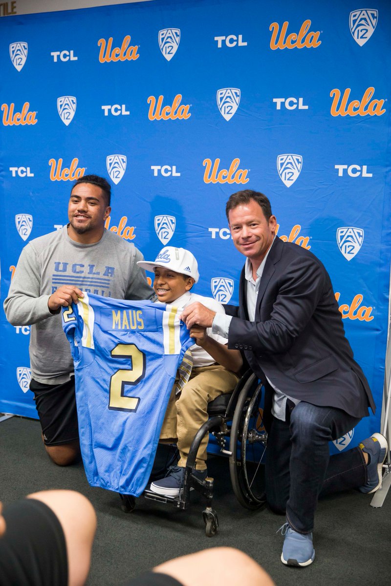 UCLAFootball's tweet photo. Meet Angelo and Alonzo Maus, the newest members of the team thanks to @GoTeamIMPACT.

#GoBruins https://t.co/XBSejmNfVR