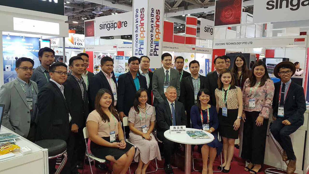 <a href="/communicasia/">CommunicAsia</a> Melon (standing center, in gray) with other Philippine delegates of <a href="/communicasia/">CommunicAsia</a> at the DICT booth
