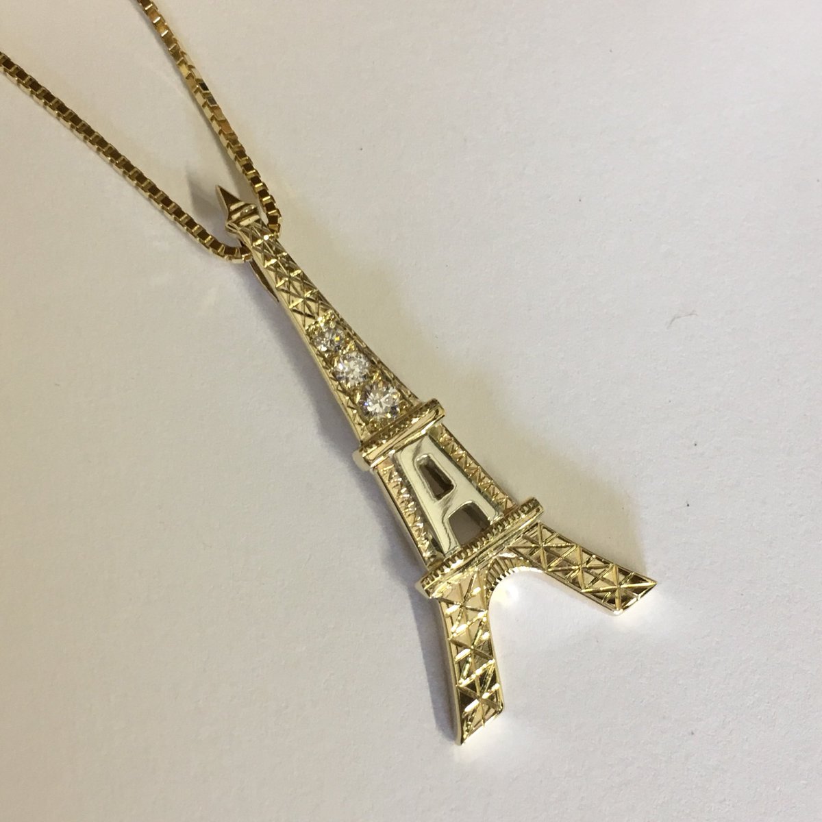 HJ_Workshop's tweet photo. We recently made the Eiffel Tower! #personalised #gold #diamonds #pendant #paris https://t.co/lf0LVocwPt