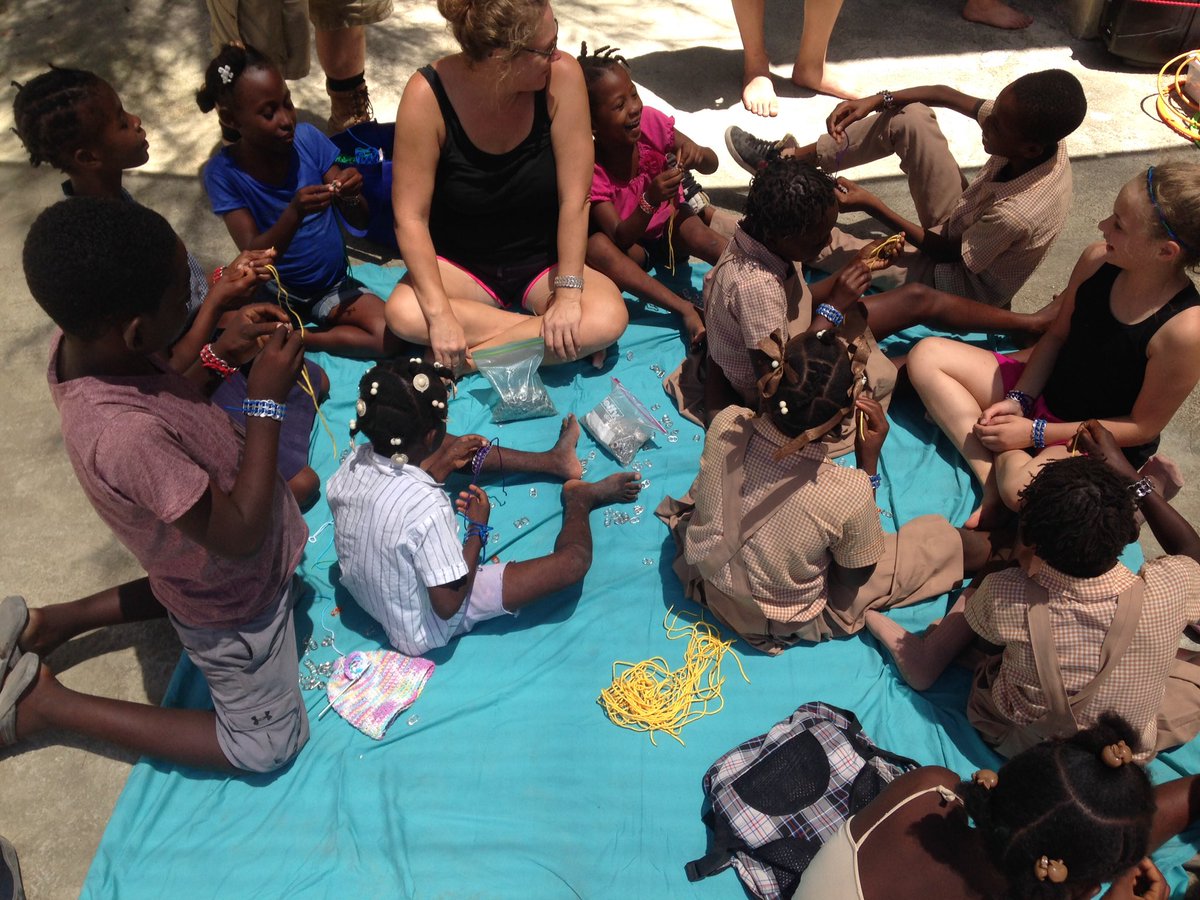 RootedMissions's tweet photo. We had an awesome day with our team yesterday teaching the kids in the neighborhood to make bracelets! Can't wait for today!! https://t.co/9qz52mfEuv