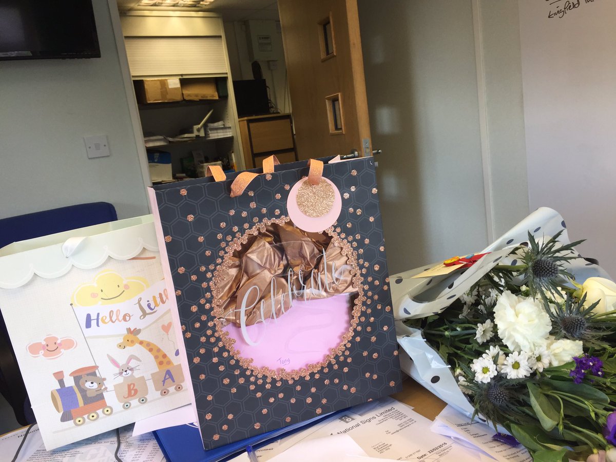 Lovely cards and gifts from the team at work on the birth of my daughter.