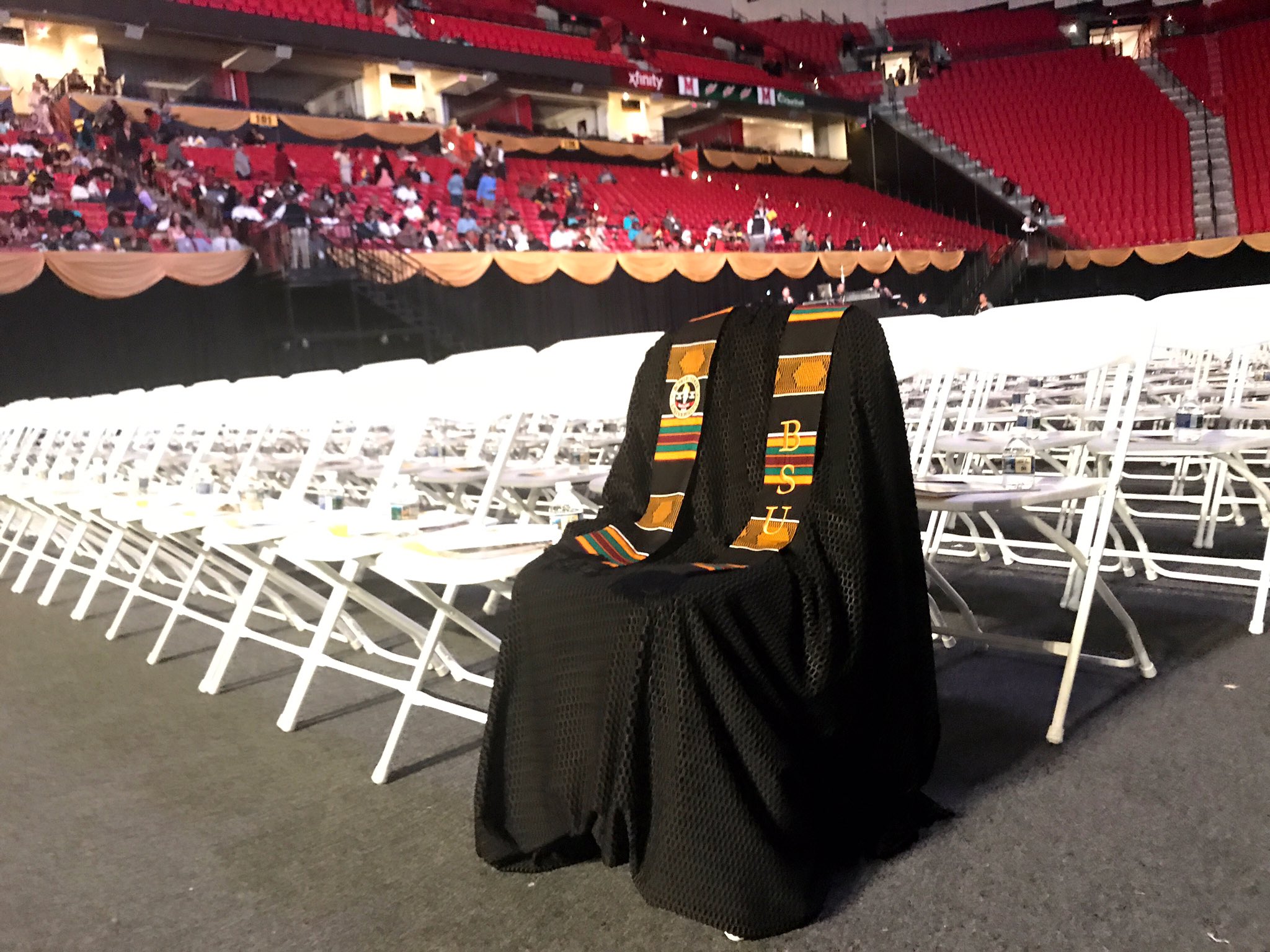 Neal Augenstein‏ at WTOP Radio in Washington, D.C. posted this photo on Twitter: @AugensteinWTOP -- Richard Collins III's graduation gown draped over front row chairs at Bowie State University ceremony. He was murdered Saturday.