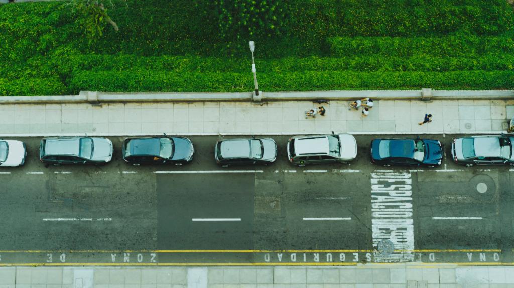 Aerial photo of cars parked on the side of the road