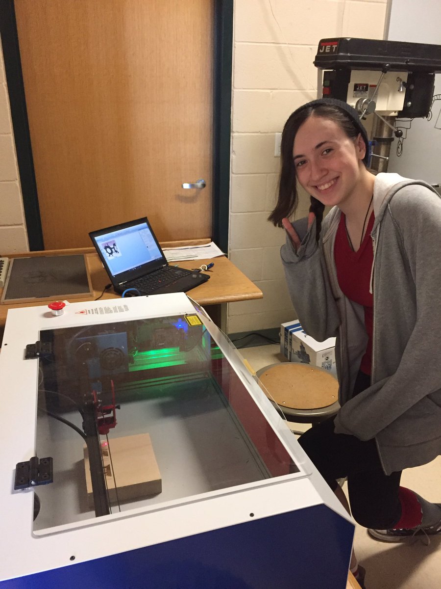 Laser engraving with a student Sara
