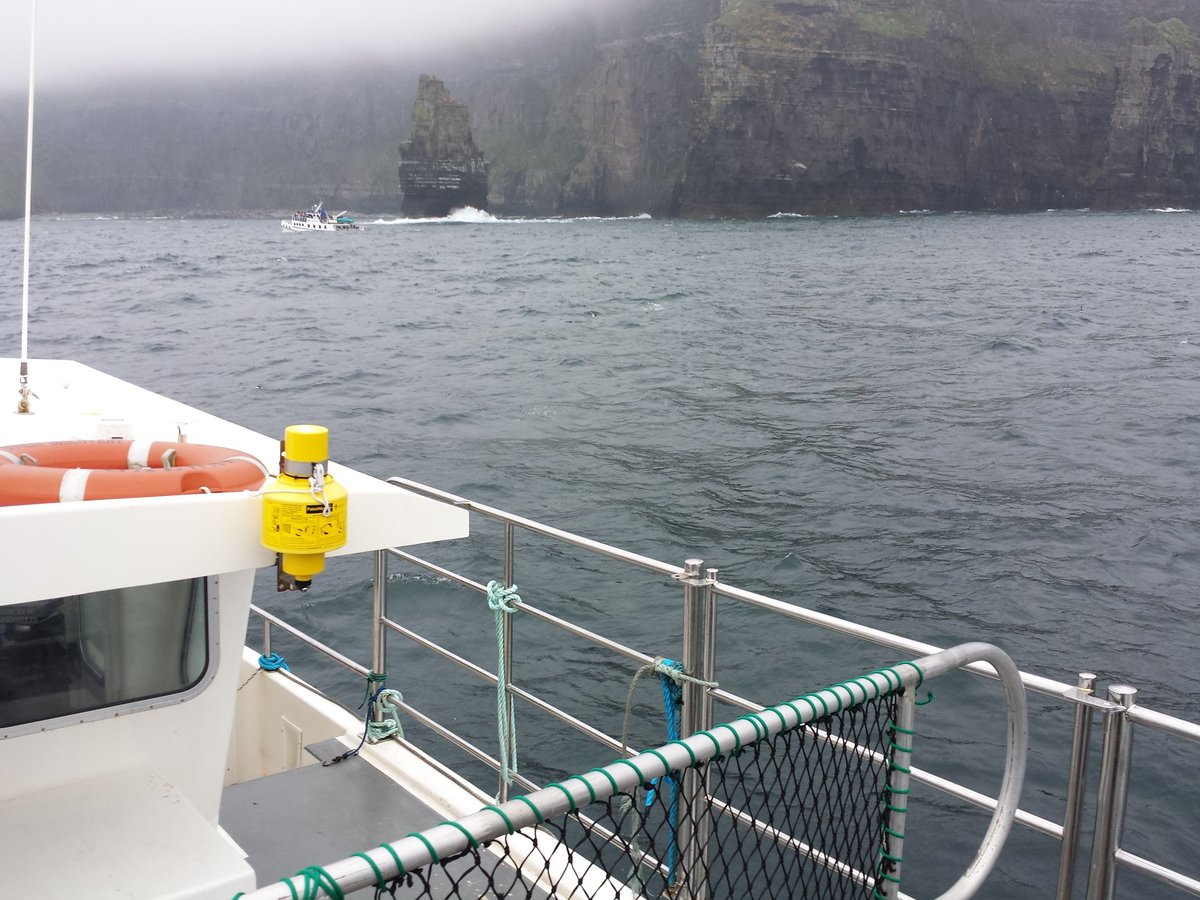 PlumsOnAPlane's tweet photo. On our way back to Doolin, we swung by the #CliffsMoher. They look a lot more imposing from the sea than from on top! #foggy @Doolin2Aran https://t.co/MpoUSeTX6P