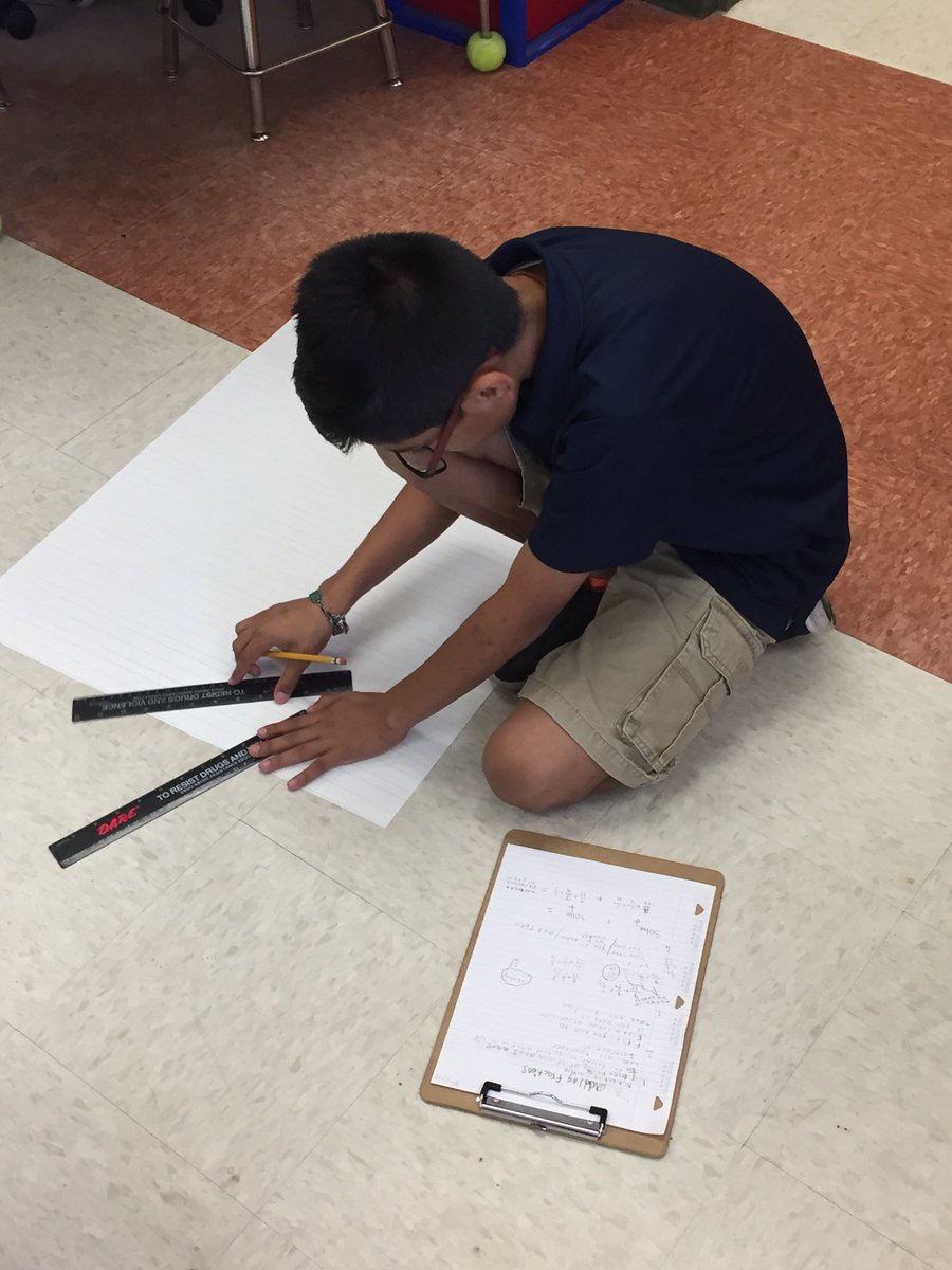 MsQuinFTW's tweet photo. The #quinners are working on their lesson plans. They picked a math topic we learned &amp; will teach the class. @ParksideProud @CCPSk5math https://t.co/xe1c6RDFxJ