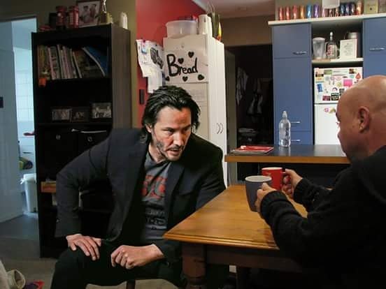 davechapstar's tweet photo. A cuppa tea with keanu.  He couldn't decide whether to take the blue cup or the red cup 😆 https://t.co/4oUpIbcwZ4