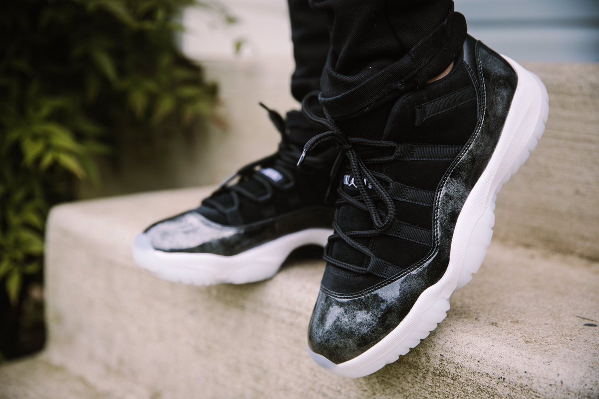 jordan 11 low barons on feet