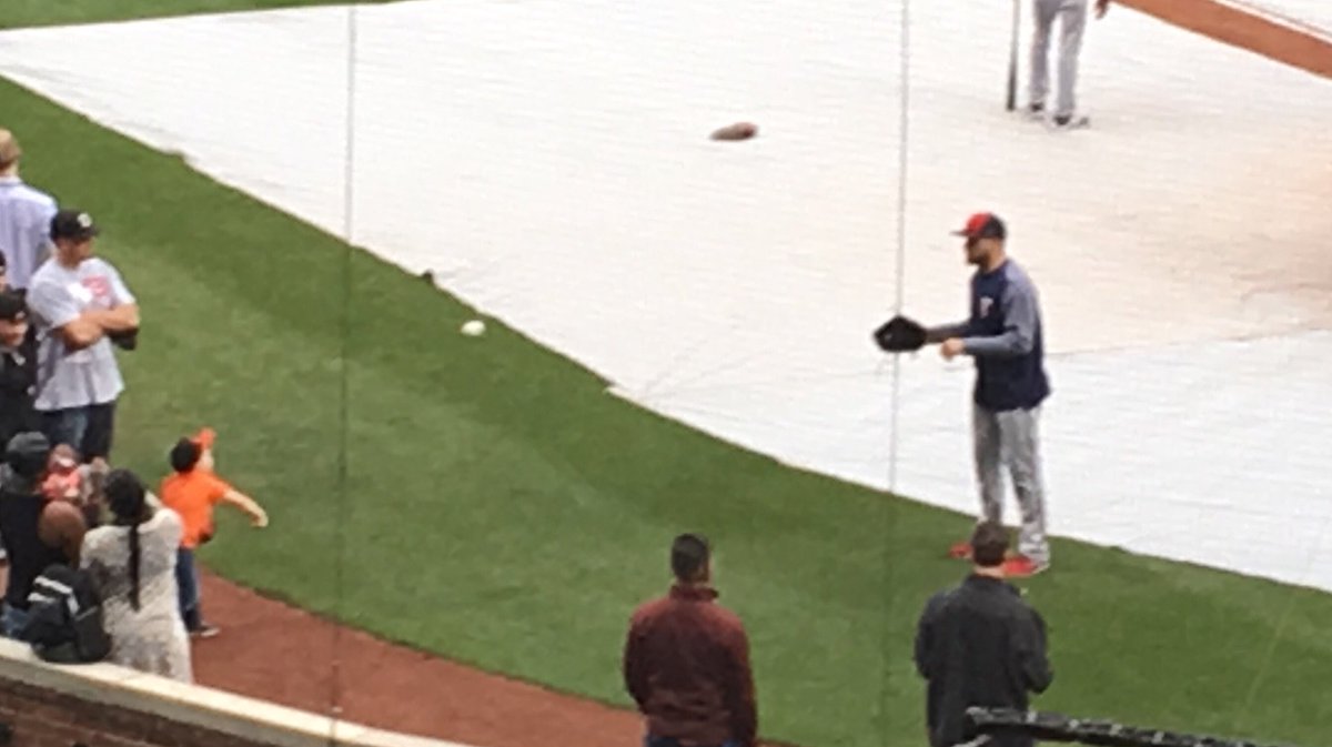 Not content to just sign 2-year-old Orioles fan's ball, Hector Santiago has been playing catch with the youngster for 10 minutes.