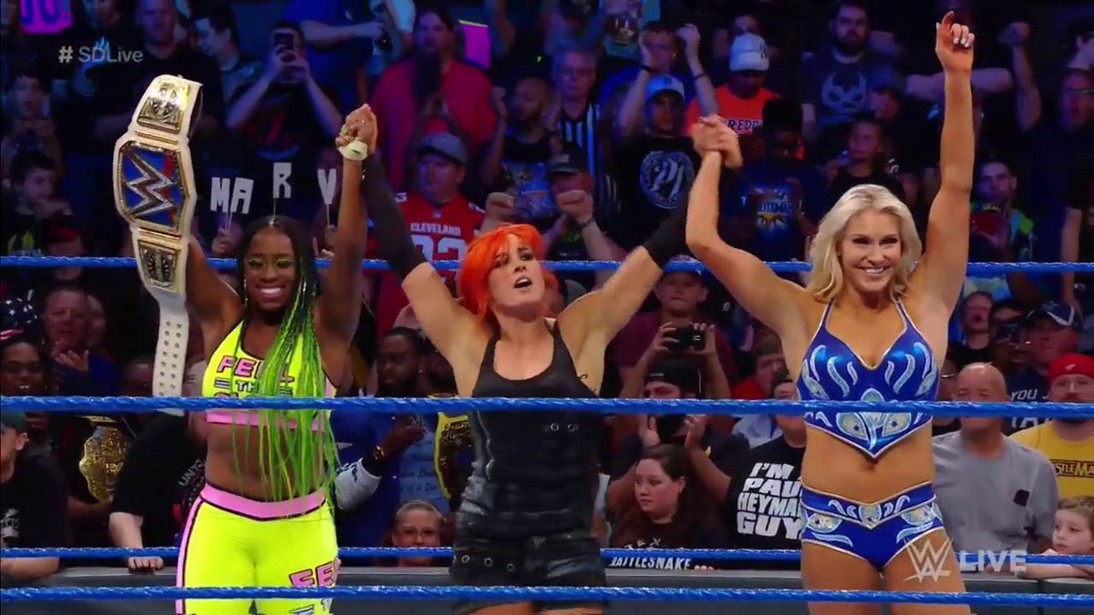 WWE's tweet photo. They were on the same page tonight! @BeckyLynchWWE, @MsCharlotteWWE and @NaomiWWE get PAYBACK by picking up the victory on #SDLive! https://t.co/xEilLoXhGD