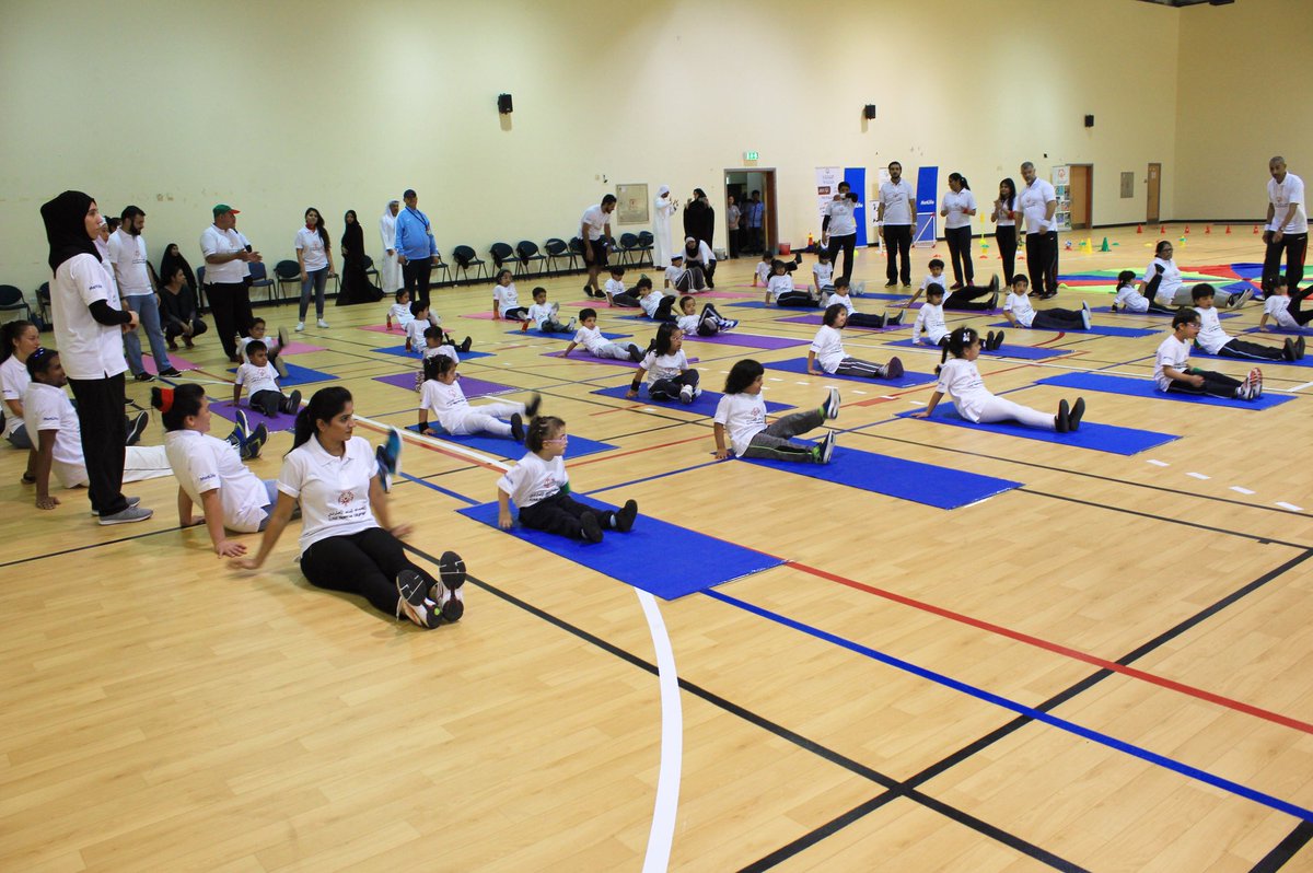 varda9's tweet photo. @MetLife volunteers and @SpecialOlympics young athletes in action during the #MetLifeCW event in UAE https://t.co/ypVSktaC8W