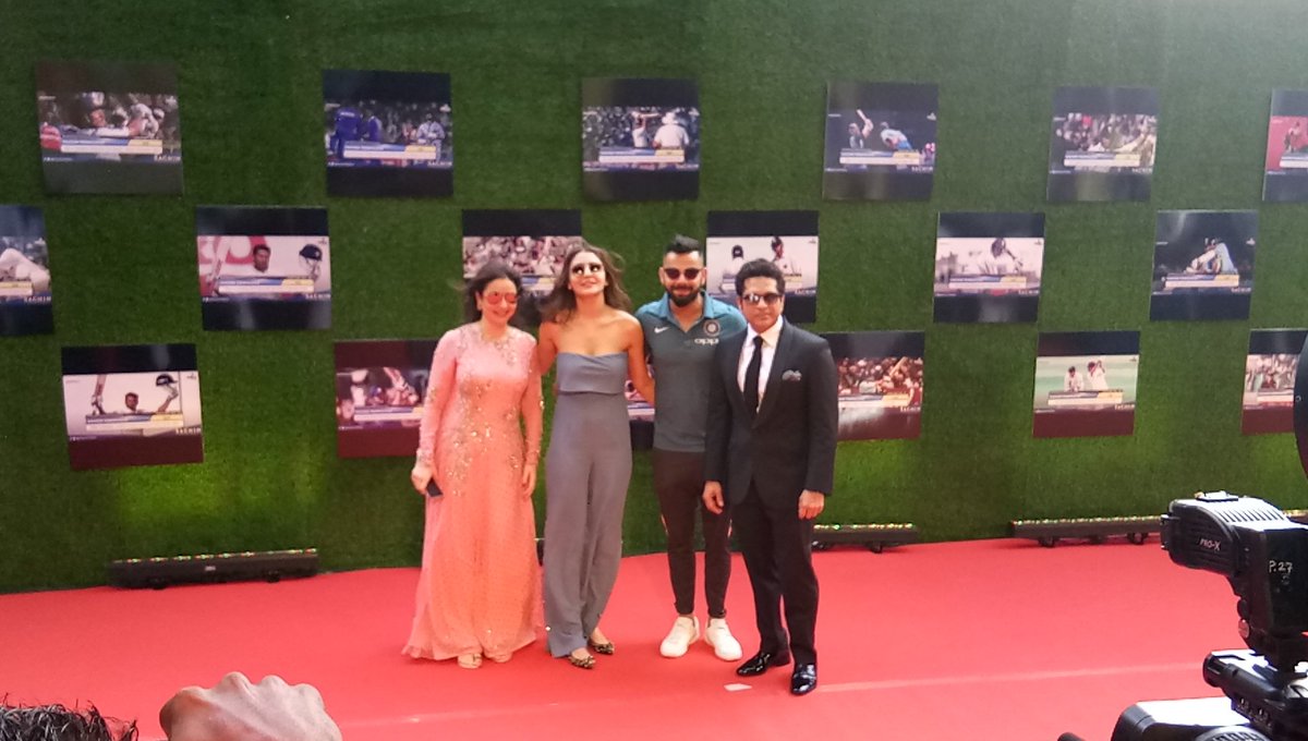 thakur_shivangi's tweet photo. @imVkohli with @AnushkaSharma at @sachin_rt's film premiere. @SpiceSocial1 @SachinTheFilm #SachinABillionDreams https://t.co/NvGfypPwR8