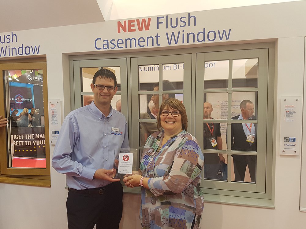 BSI_UK's tweet photo. .@MascoUKFab receive #kitemark certificate for new flush casement window @fitshow https://t.co/xCrQo4CGAW