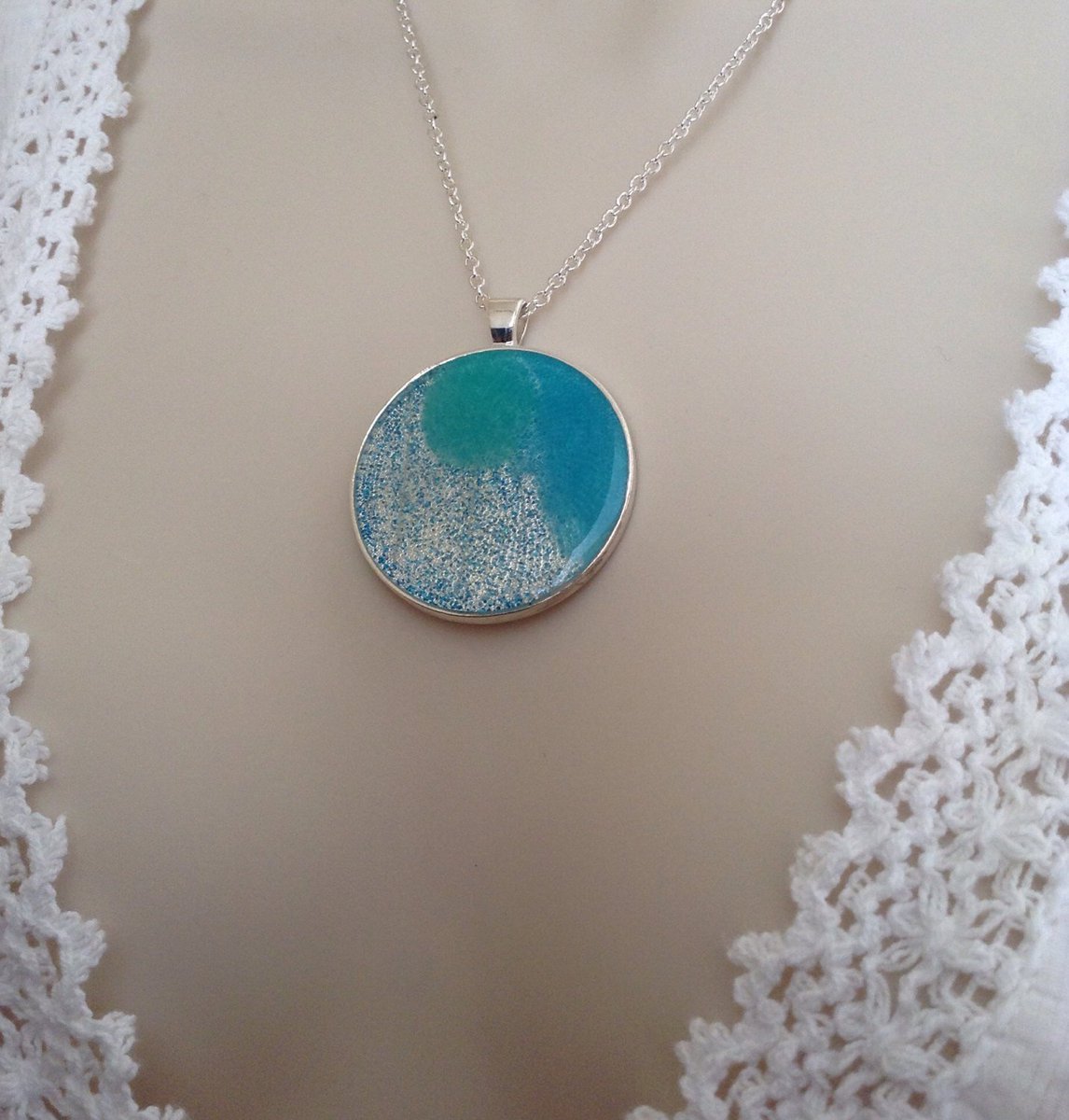 ArtisanJByViv's tweet photo. Turquoise Resin Pendant, Statement Necklace, Resin Jeweller… https://t.co/D6YuJRetvH #BeadsofCreation #BirthdayToken https://t.co/Q9qkkklGb9