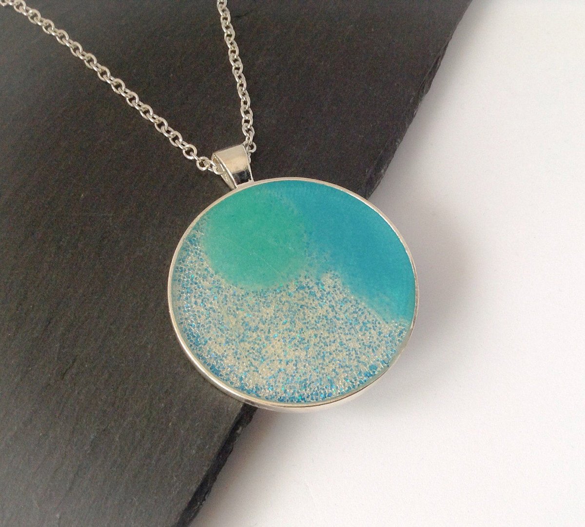 ArtisanJByViv's tweet photo. Turquoise Resin Pendant, Statement Necklace, Resin Jeweller… https://t.co/D6YuJRetvH #BeadsofCreation #BirthdayToken https://t.co/Q9qkkklGb9