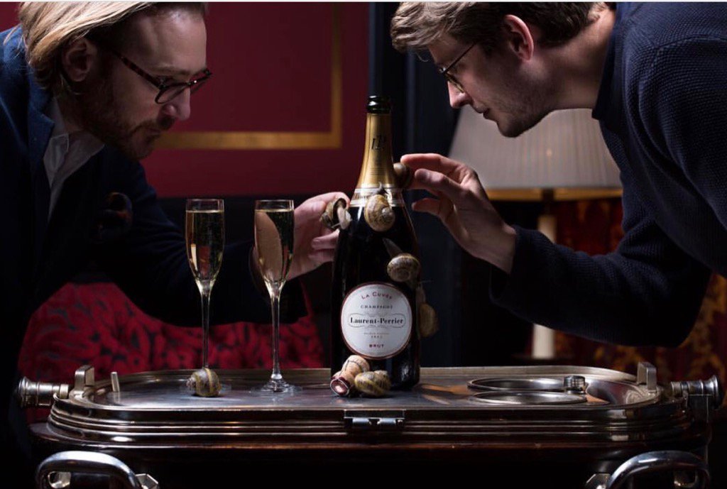 Happy #NationalSnailDay <a href="/DannyBorchertLP/">Danny Borchert</a> and <a href="/pellyjnr/">George Pell</a> racing snails up a magnum ofChampagne Laurent Perrier !