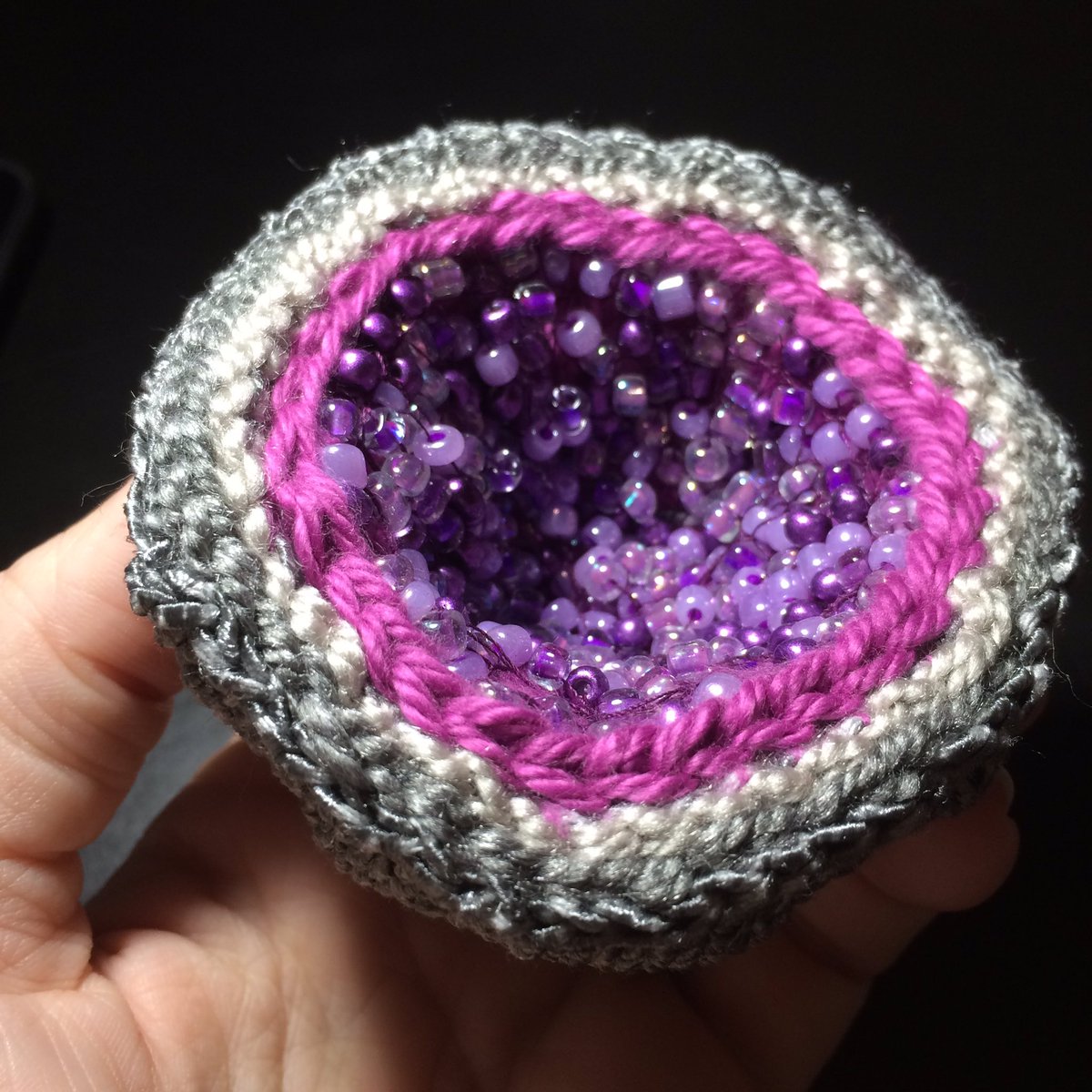 Beaded knitting inside geode