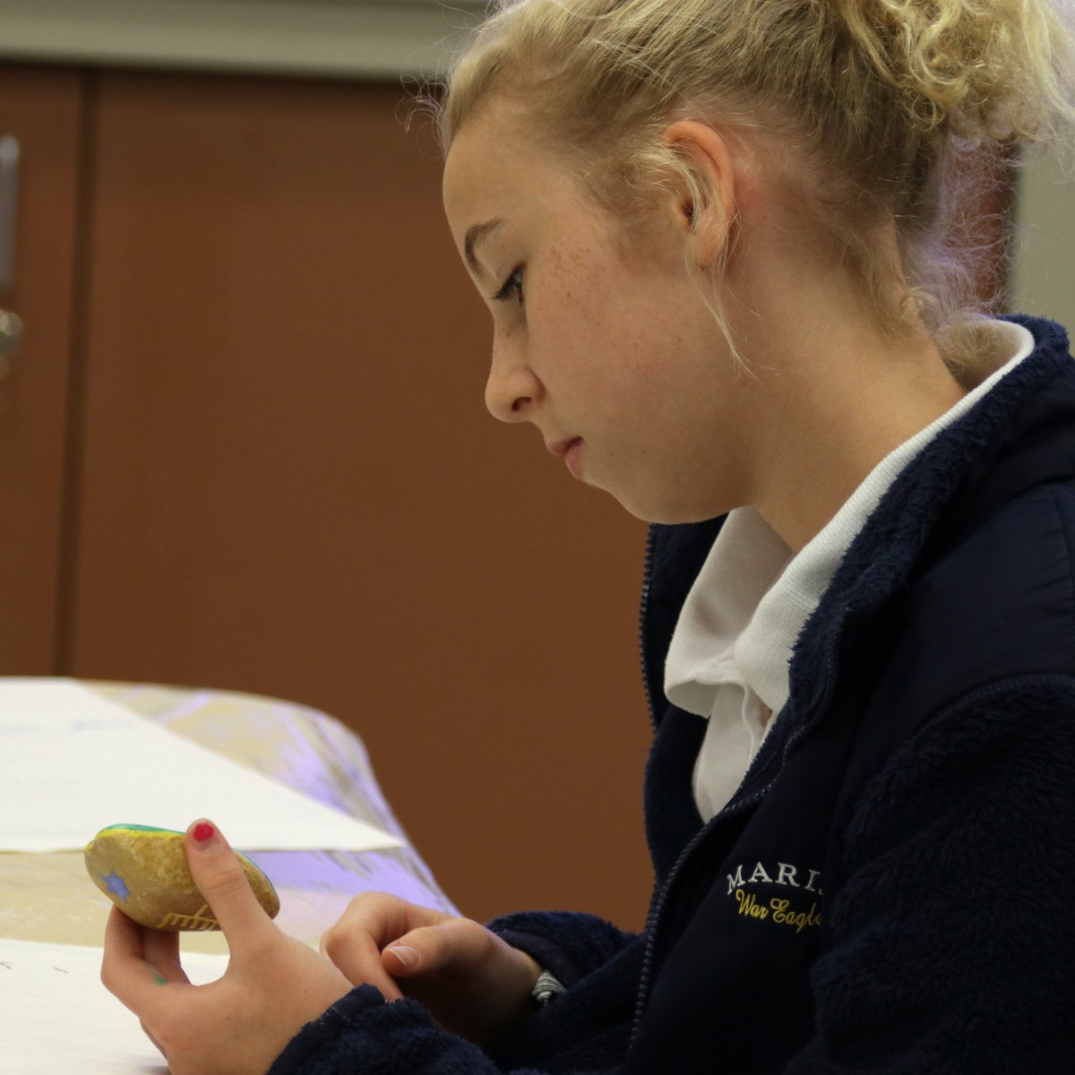 Ms_Justus's tweet photo. Students painting stones for the Holocaust Stones of Remembrance Project - thank you to our visitors for sharing your stories with us! https://t.co/4WfupcdyWQ