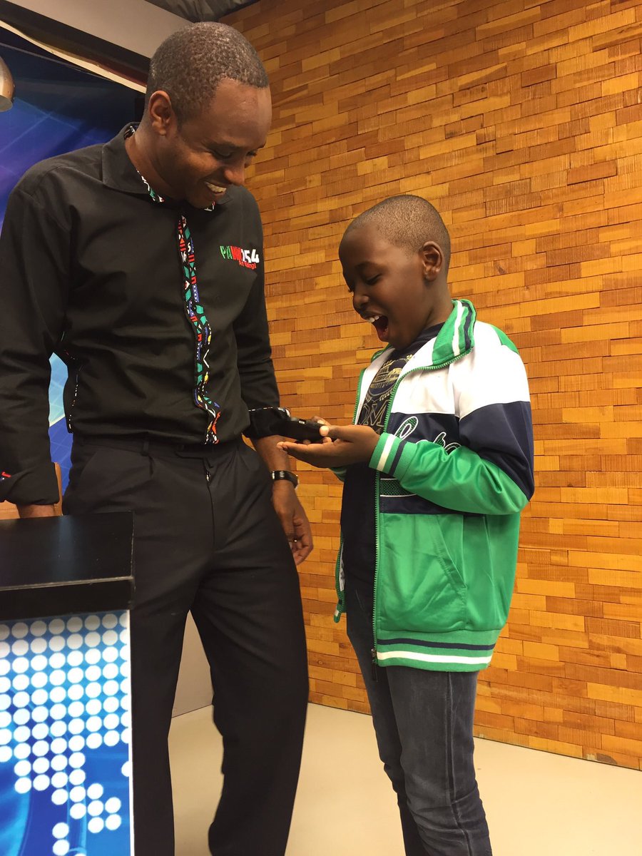 bonifacemwangi's tweet photo. Last year @EzekielMutua and l were interviewed by @LarryMadowo. Now he claims his son cried in the studio but he is lying! Photo evidence. https://t.co/Qksj1mB8AS