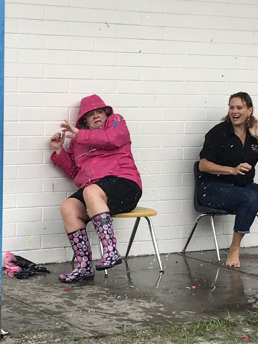 Admin getting blasted with water balloons since kids reached RC goals #over30,000points #goodsports #doingitforthekids kids. @SLMEnterprise
