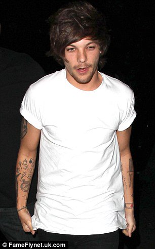 Same lips red, same eyes blue
Same white shirt, couple more tattoos