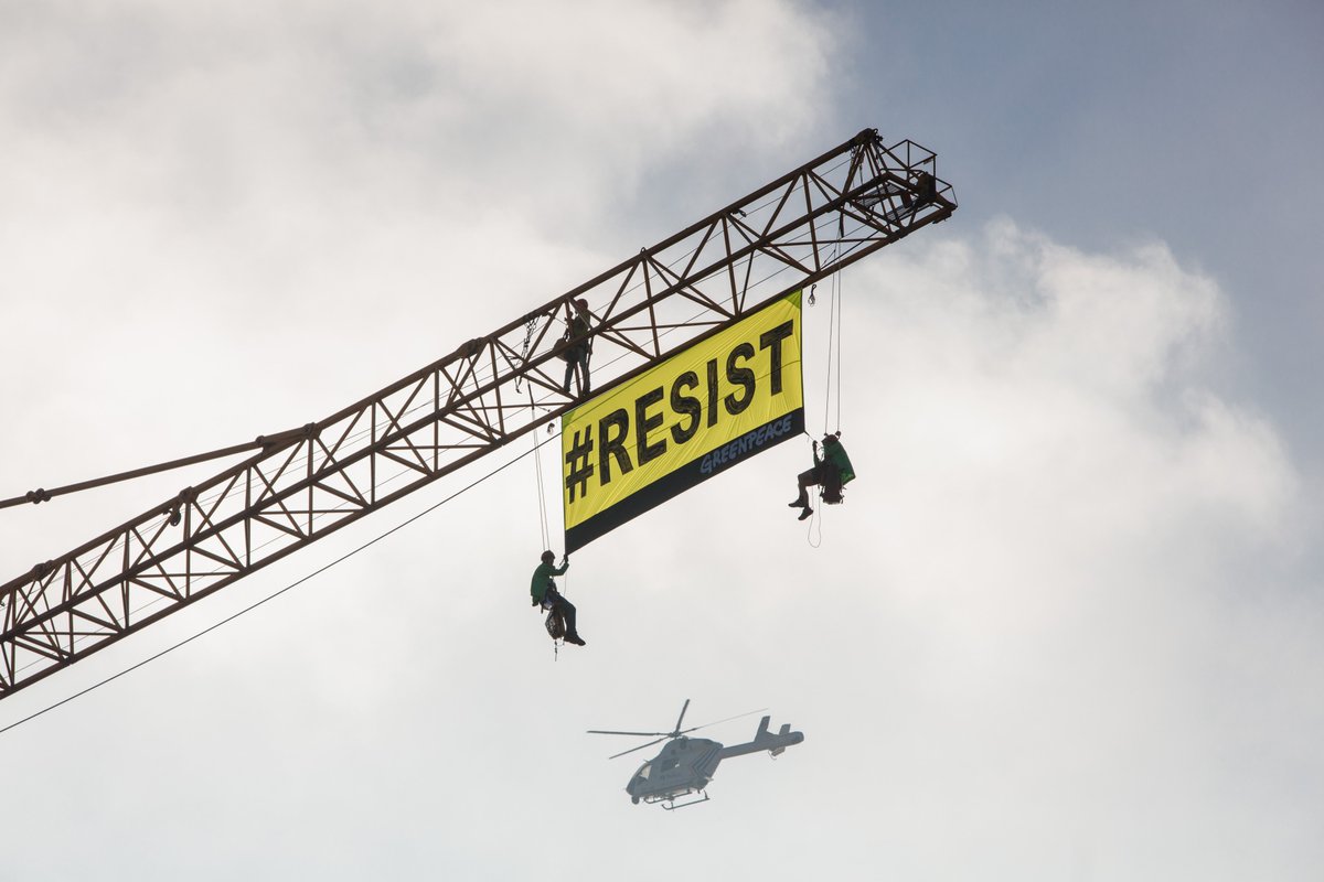 greenpeace_be's tweet photo. If @realDonaldTrump  looks through his windows, he will see that we are here to #RESIST ;) https://t.co/meraArOSgi