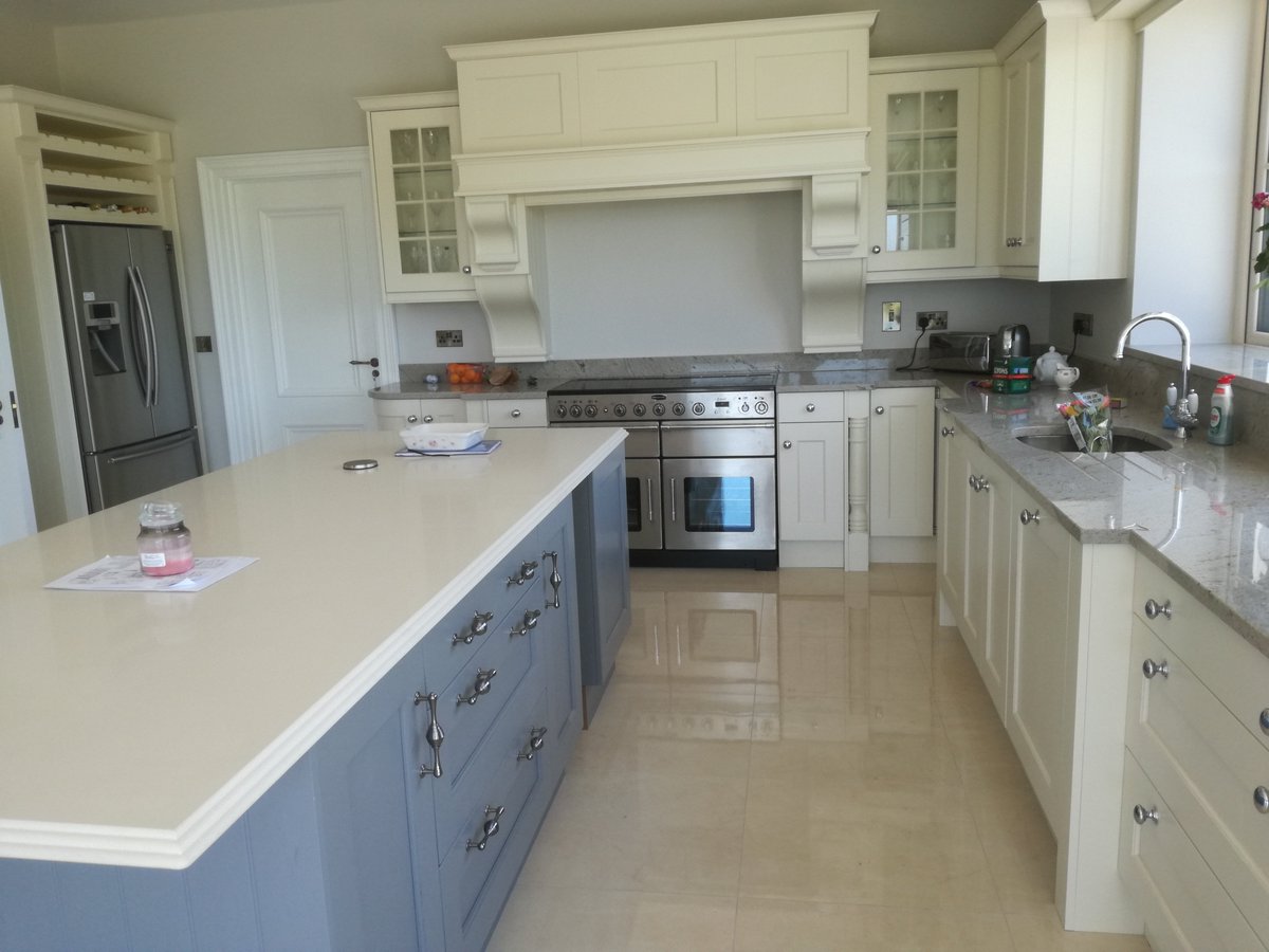 OrnanKitchens's tweet photo. Solid ash kitchen painted Ivory &amp; Dust Grey with stunning fireplace canopy and step out features recently fitted near Navan. @Kitchen_Stori https://t.co/oLvniJXcPd