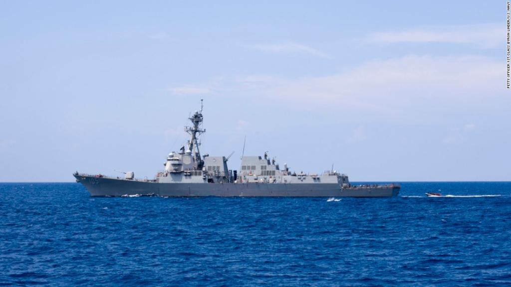 cnni's tweet photo. US Navy destroyer sails close to disputed South China Sea island controlled by China for first time under Trump https://t.co/u91h0iP57P https://t.co/2jr8H24mNR